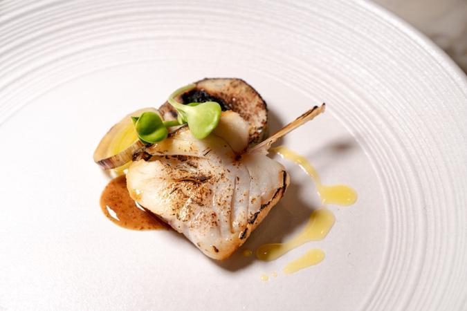 A plate of food on a white surface

AI-generated content may be incorrect.