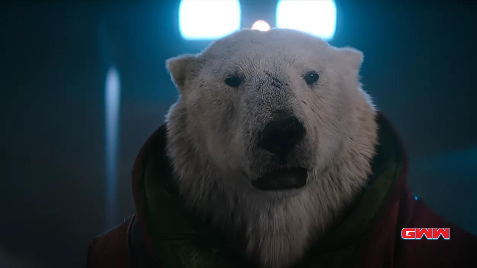 A CGI polar bear character voice by Reinaldo Faberlle with a serious expression in "Red One" movie.