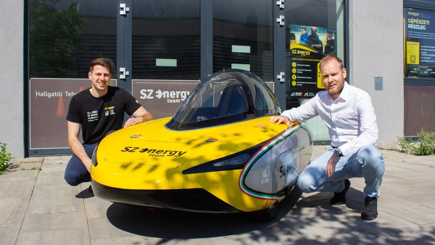 Zoltán Pusztai and Kornél Vági with the world record-breaking vehicle of the SZEnergy Team, which has been registered as a design patent