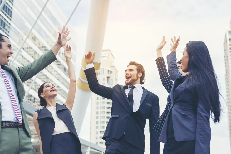 Business people celebrating a win