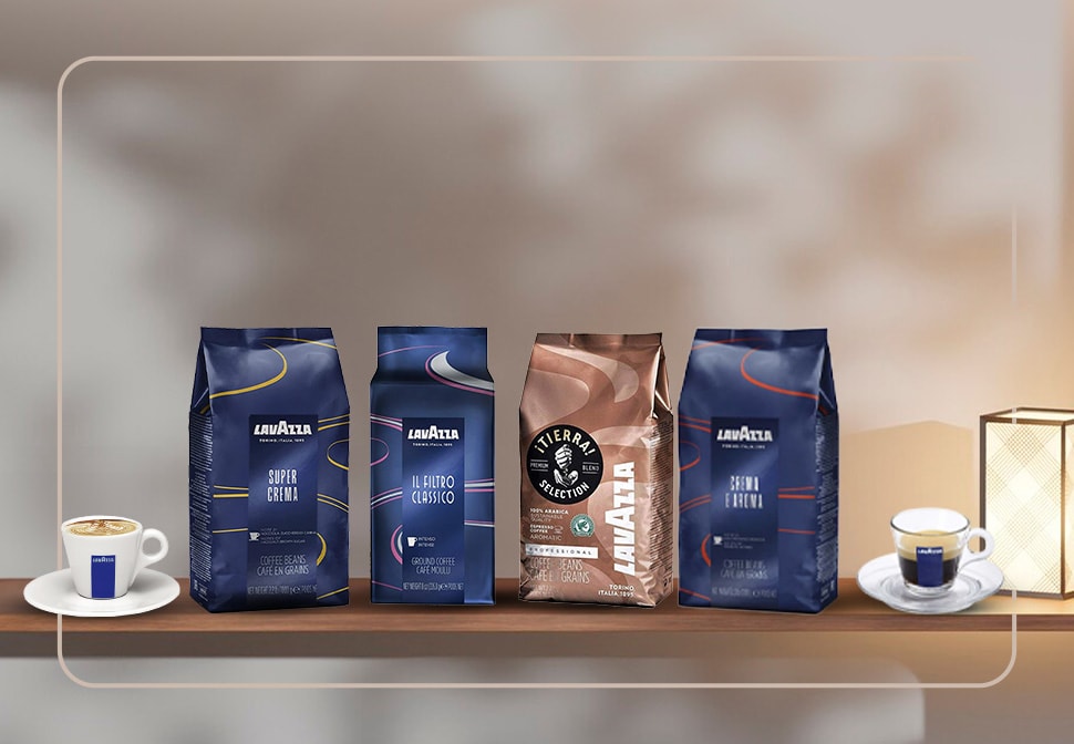 Four bags of Lavazza coffee beans and two cups of freshly brewed coffee.