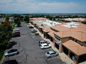 Parking lot and long row of big stores