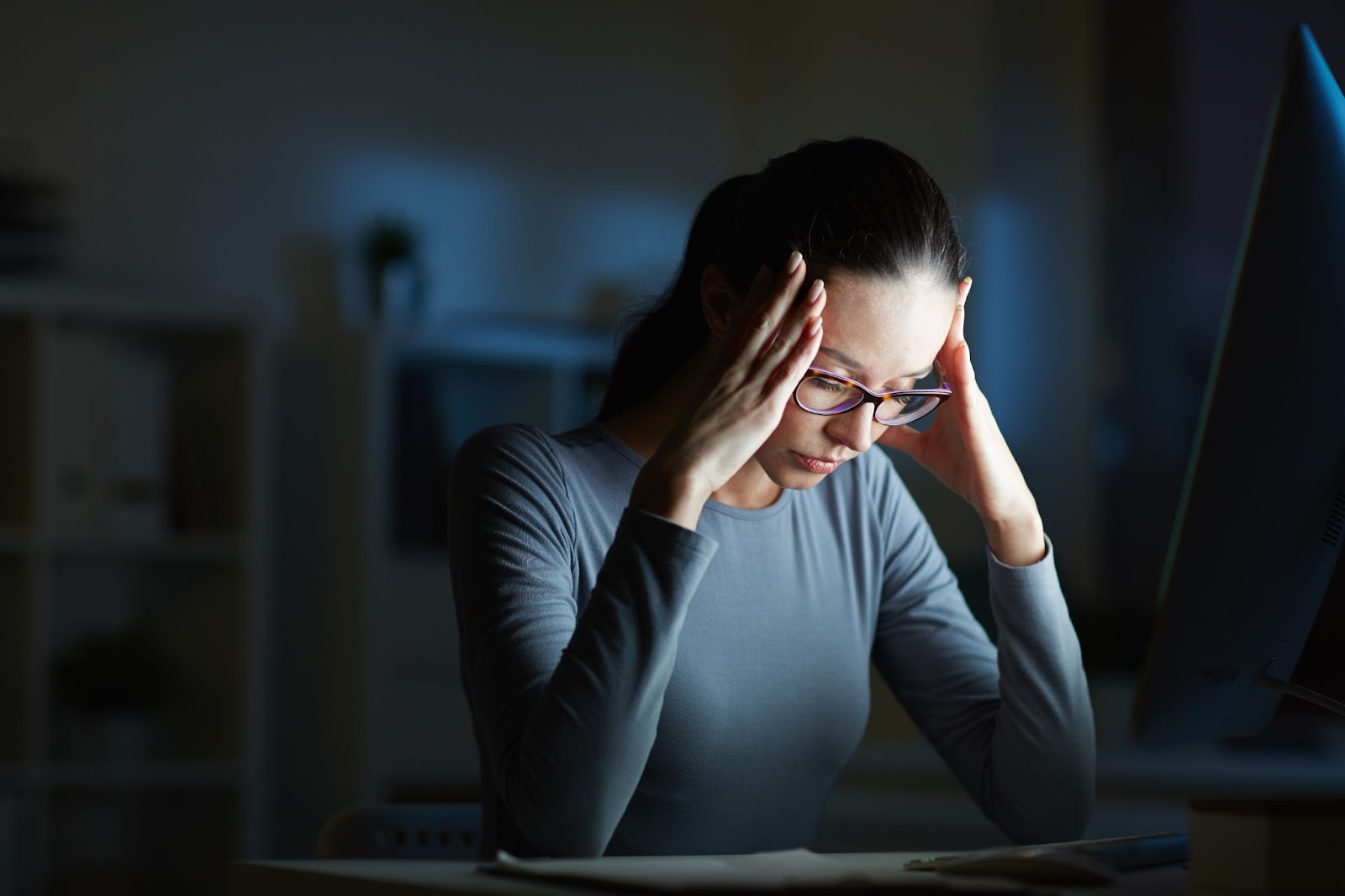 businesswoman looking frustrated while working from home needs stress management techniques