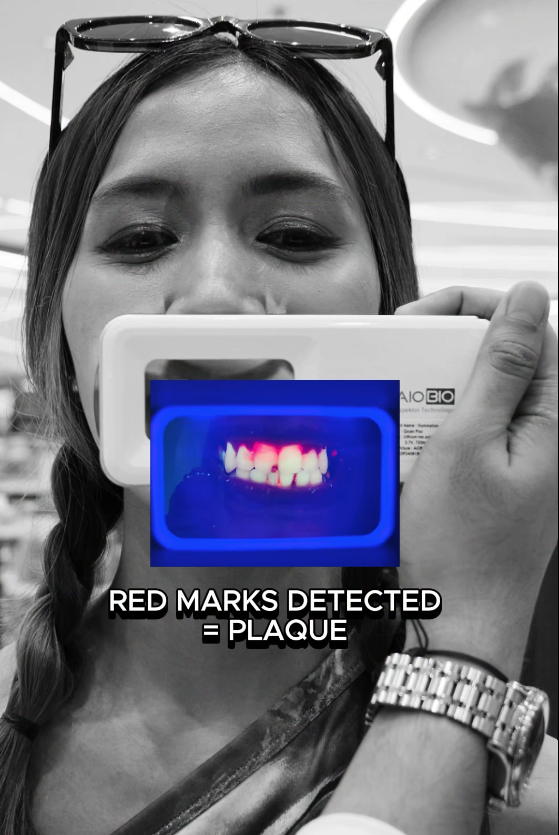 A person holding a device with a blue light

AI-generated content may be incorrect.
