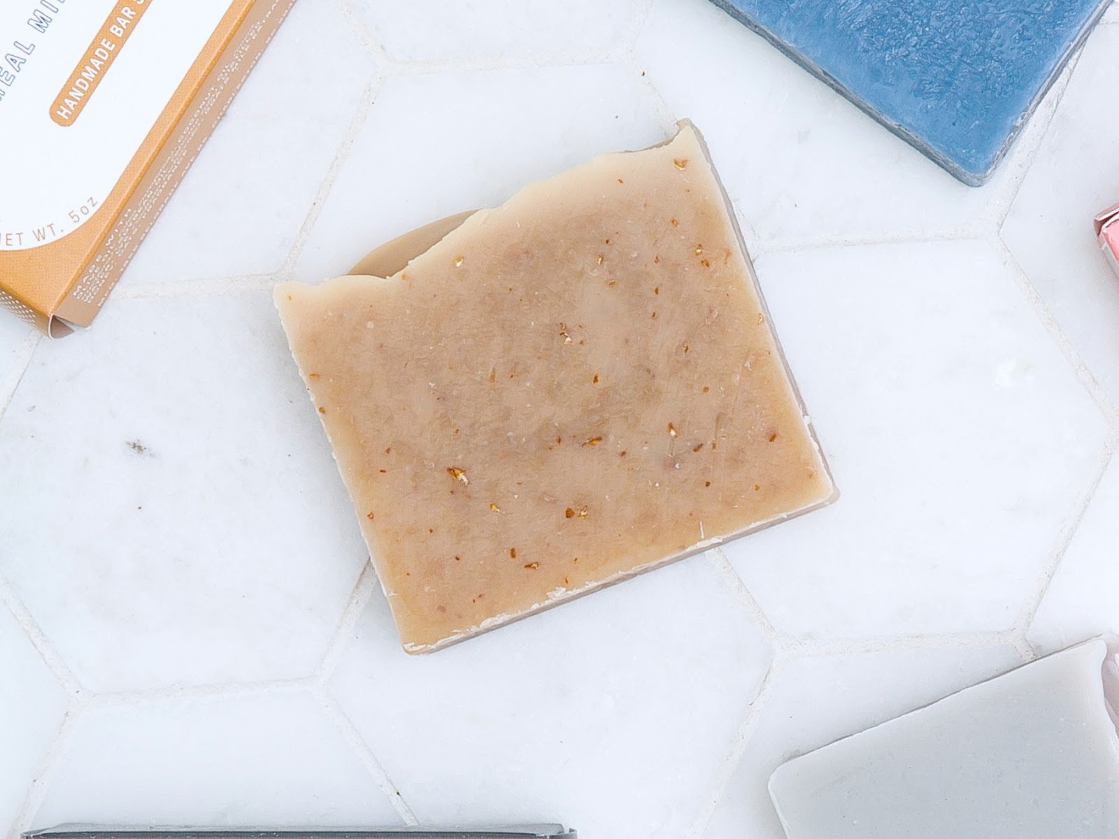 Old Whaling Co. Oatmeal Milk & Honey bar soap laying flat on marble counter