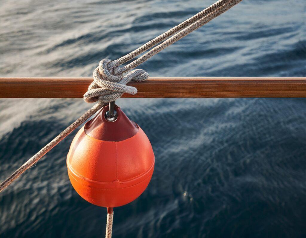 Image showing a fender tied to a railing using a clove hitch.