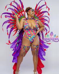 ST. MAARTEN CARNIVAL 2023 TRIBAL FANTASY Section: Orenda (Magic Power)  Costume Displayed: Monokini with Large and Small Backpiece Includes: Head  band, Jeweled Monokini, Neck and shoulder piece, Thigh Pieces ➿Section  Leader: Krave