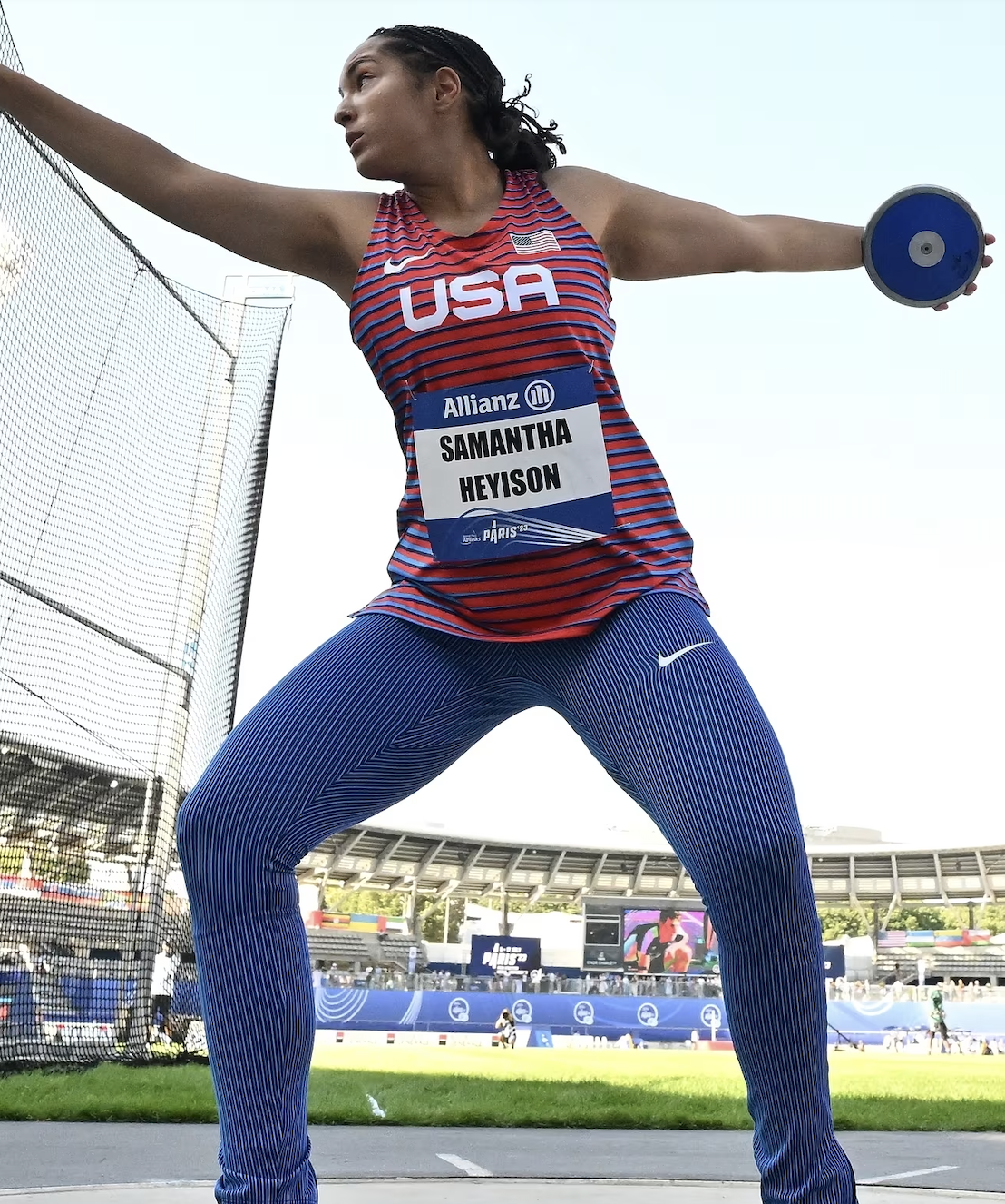 Image of Samantha Heyison throwing discus in a Team USA uniform