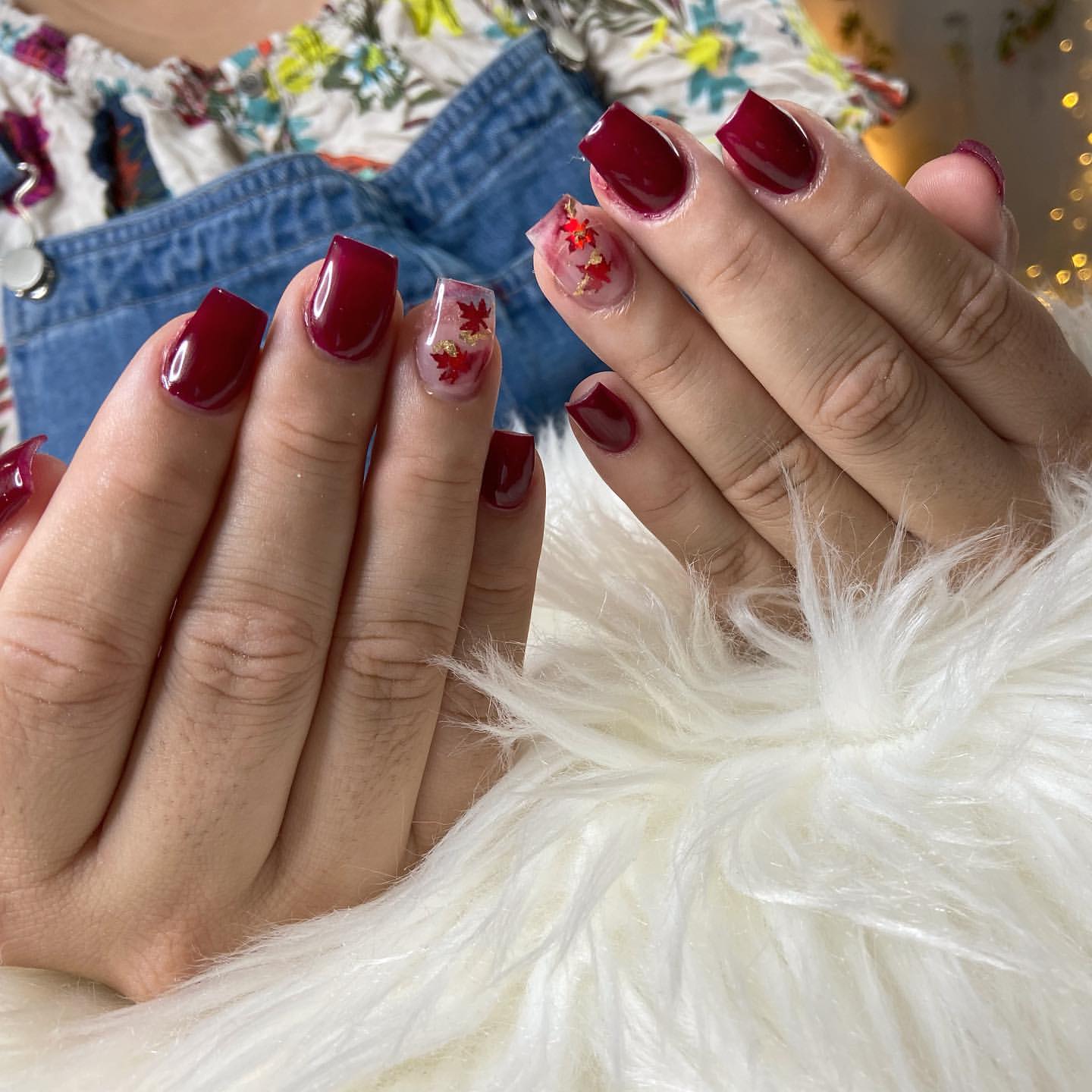 Close-up of hands with fall nail design having Single Statement Nail Designs