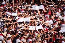 A group of people in white shirts

Description automatically generated