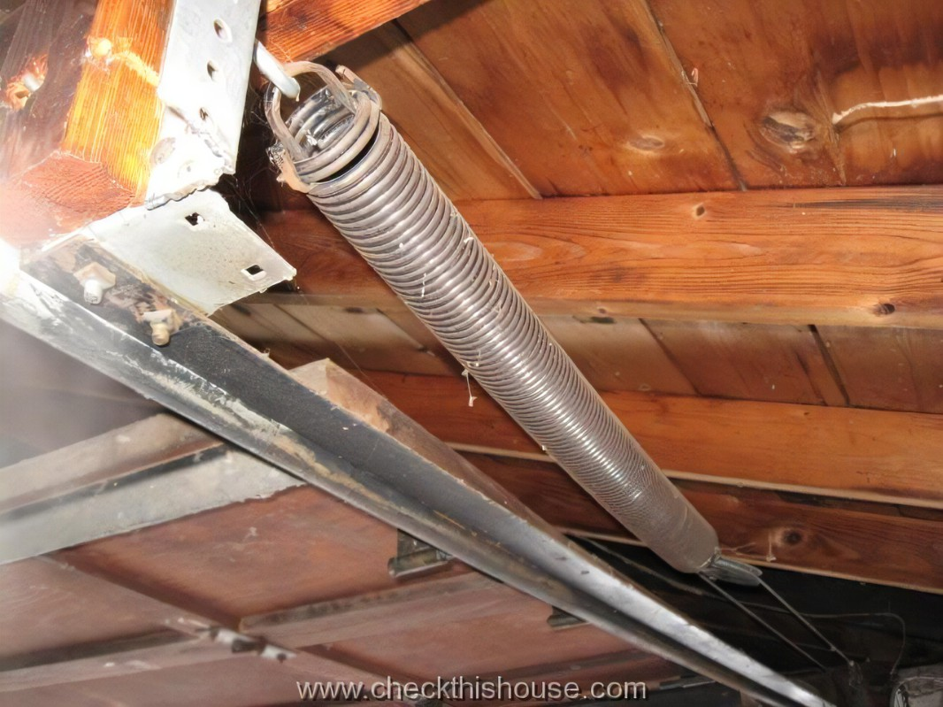 how to replace garage door spring