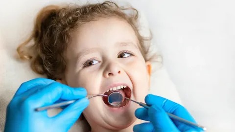 A young child receiving gentle preventive dental care at Pinnacle Pediatric Dentistry Houston, ensuring a healthy and bright smile with expert pediatric dentistry services.