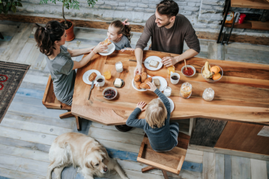 is a full house remodel worth it how to decide if its right for your family kids and couple eating breakfast at long table custom built michigan