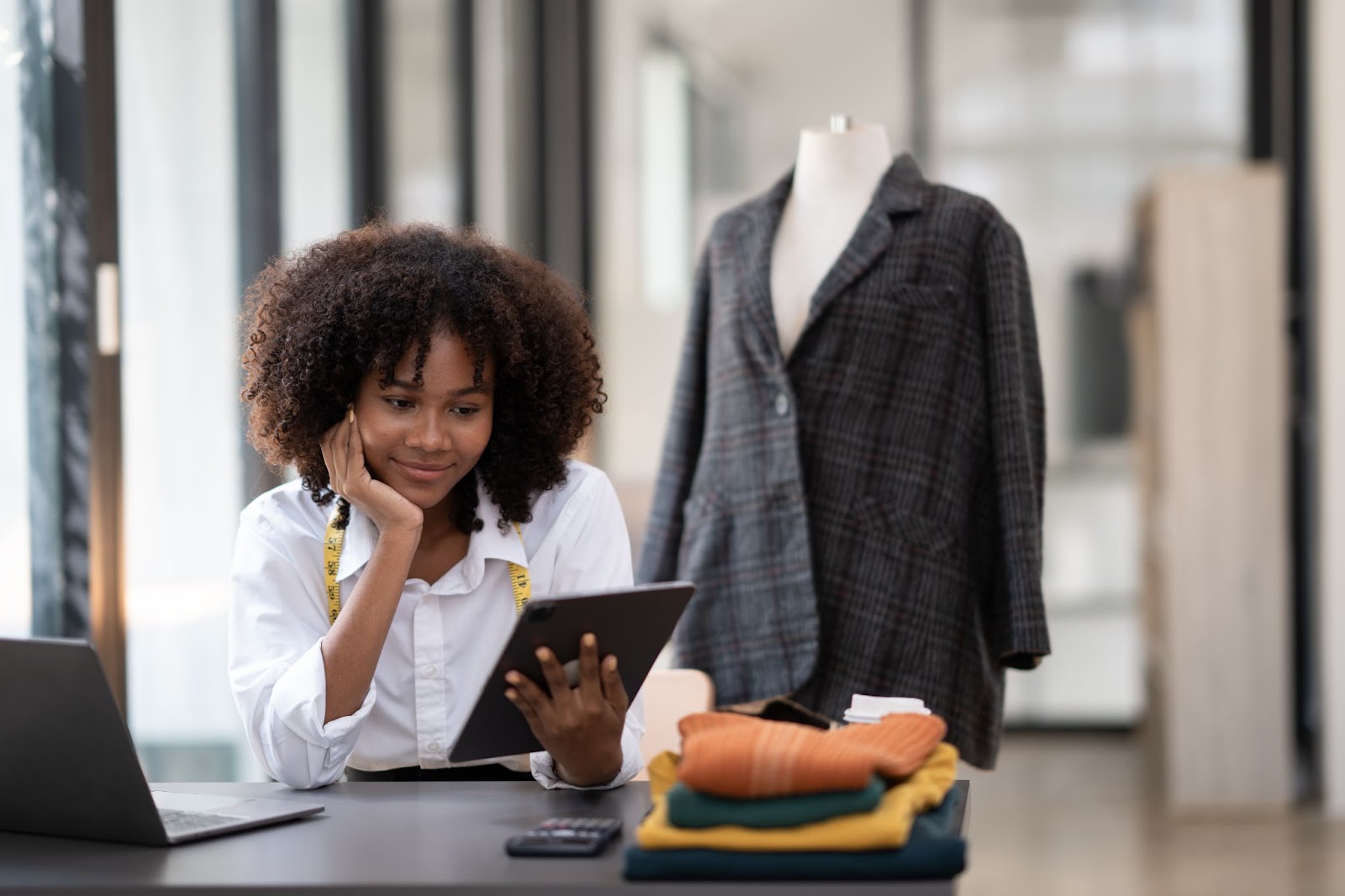 Woman reviewing the benefits of erp on her tablet