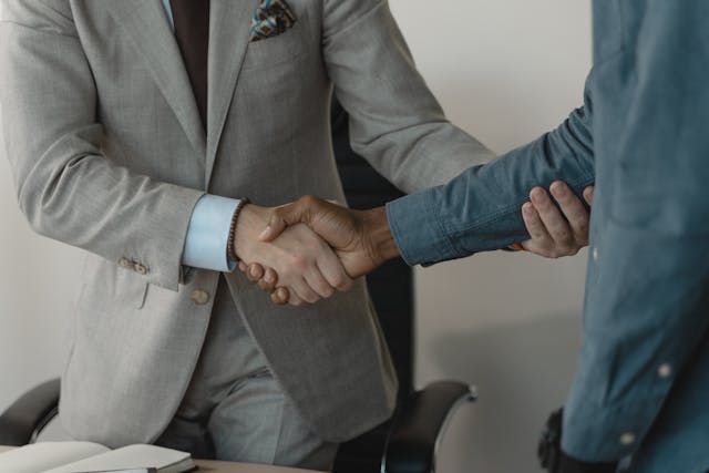 two people shaking hands