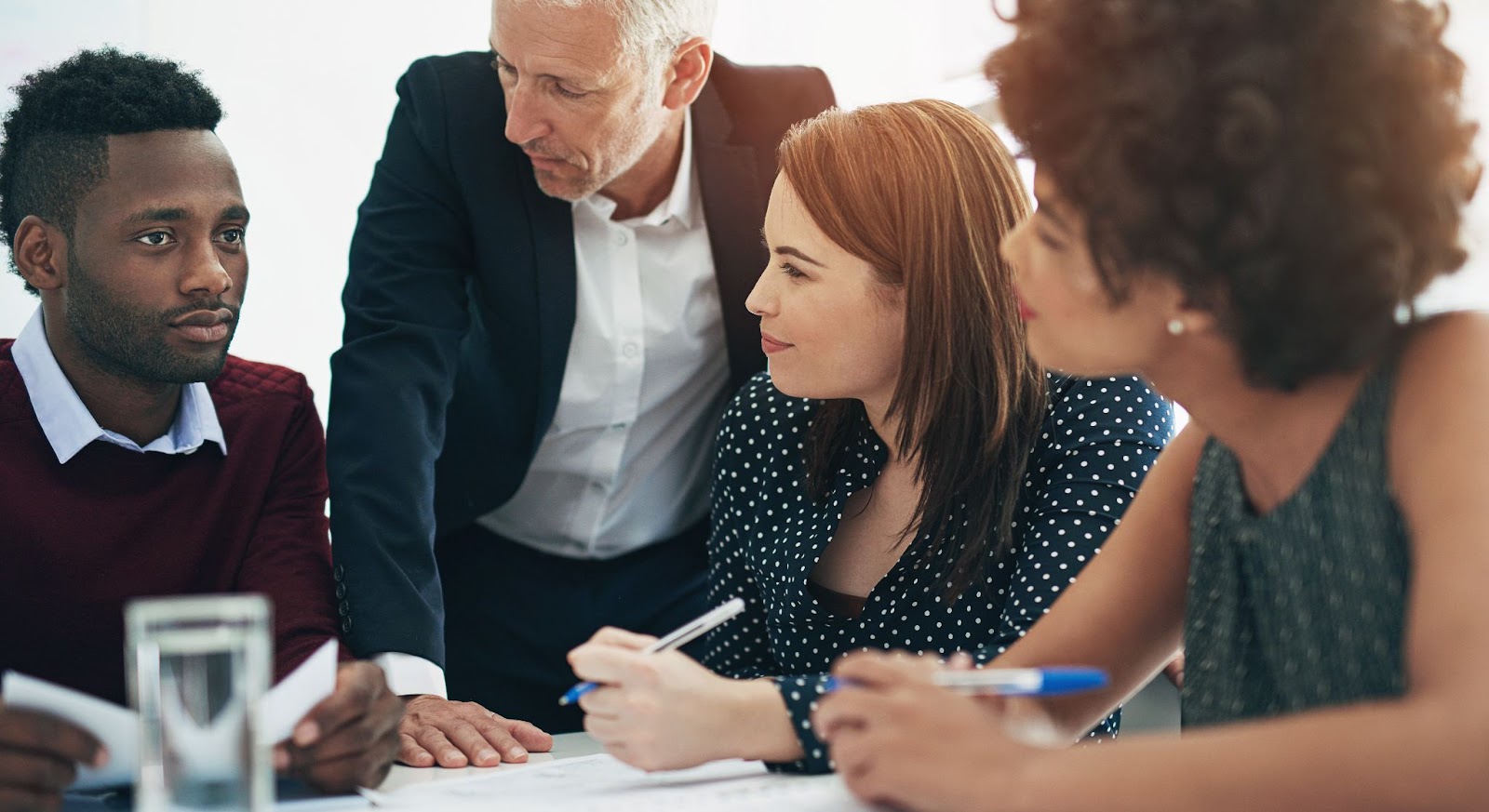  A group of employees discussing a new strategy. 