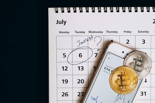 Bitcoin prediction drop below $90,000, January 6 calendar, investment graph on mobile, gold and silver Bitcoin coins.