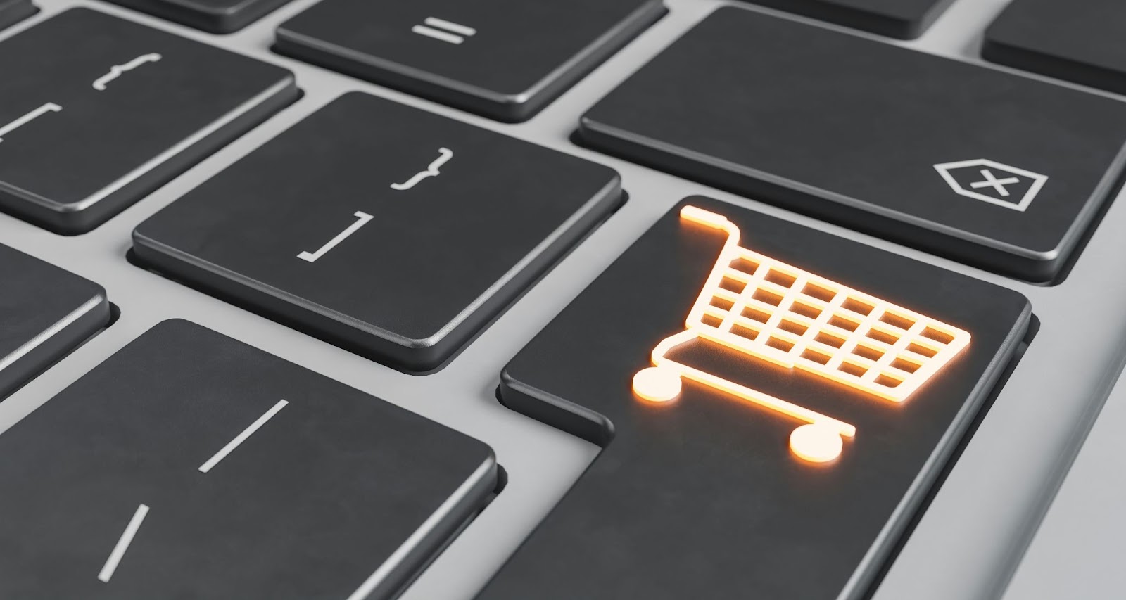 A computer keyboard with the enter button as a shopping basket.