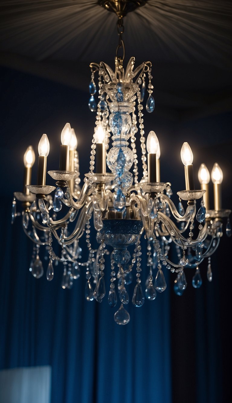 A grand blue and silver chandelier hangs from the ceiling in a dark blue bedroom, casting a soft, elegant glow across the room