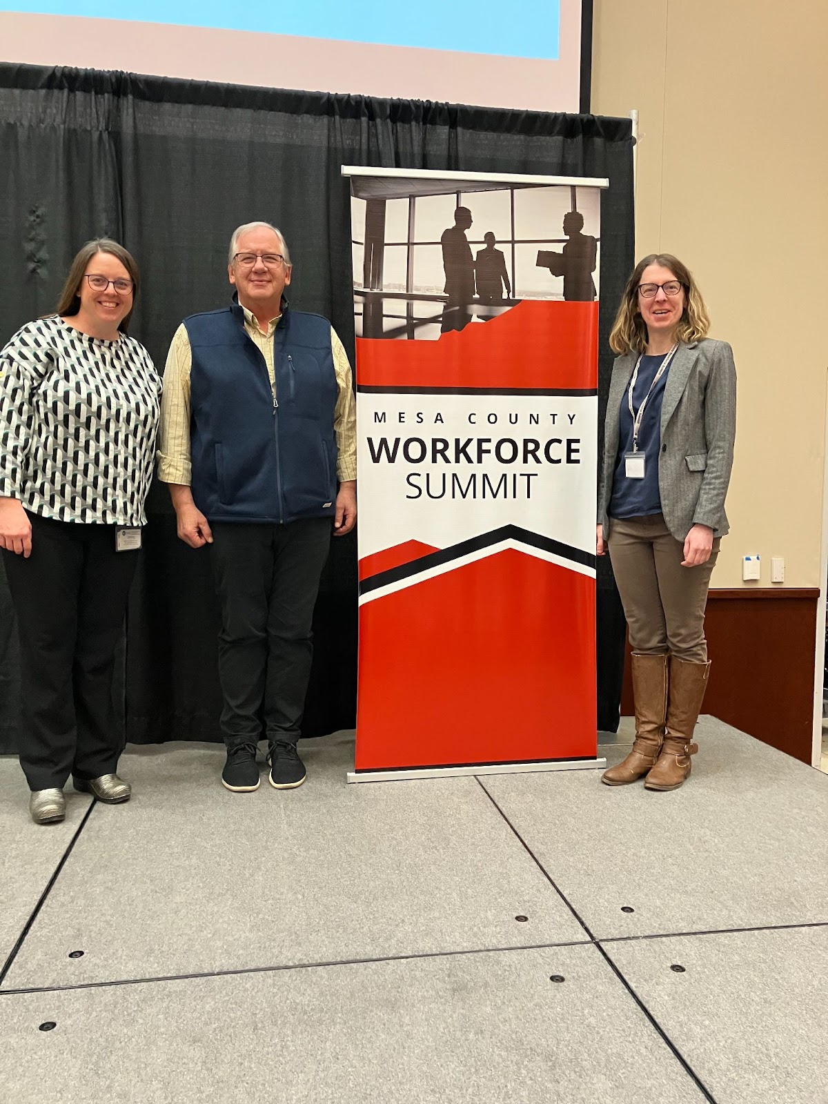 (L-R) Heather Nara, director of the Mesa County Workforce Center, stands with Bob Brasser and Jessica Maiorca.