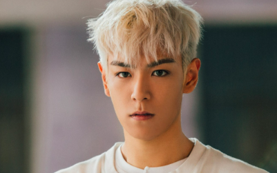 This contains an image of Big Bang T.O.P