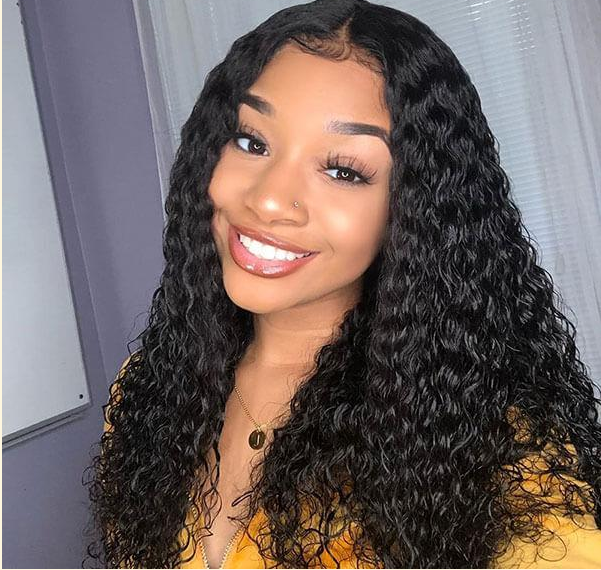 Beautiful black woman wearing human hair lace front wig