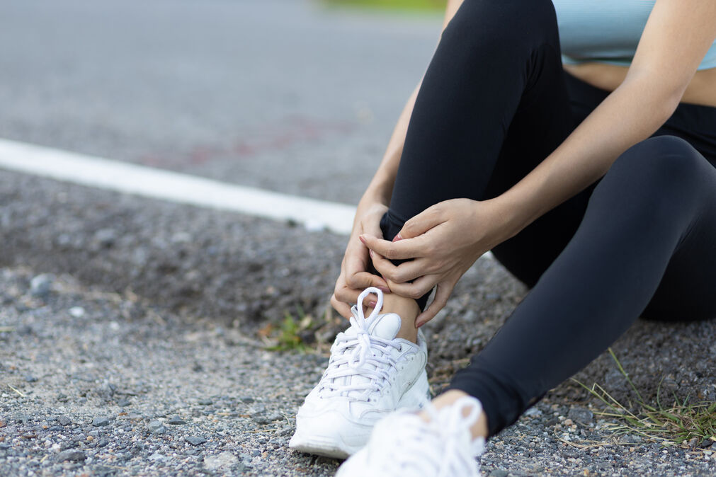 Shin Splints - lady suffering from shin splints