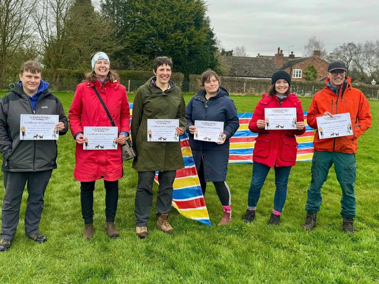 Our most recent line handling attendees proudly showing off their certificates of attendance