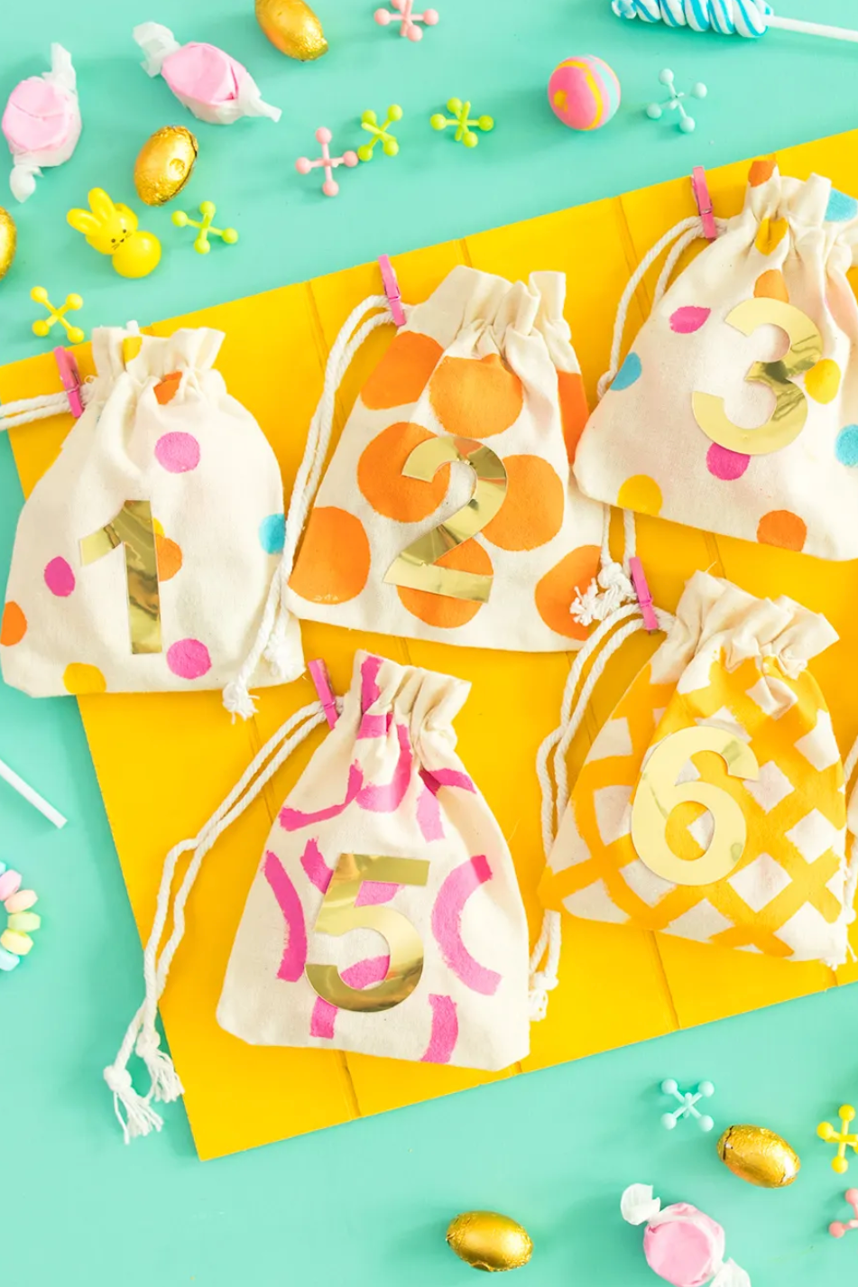 easter egg hunt ideas, colorful advent calendar goodie bags with numbers on the front