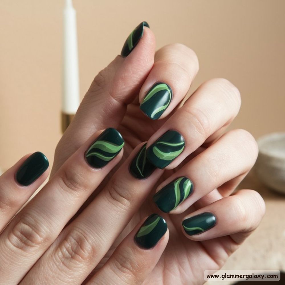 Winter and Fall Dark Green Nails having Artistic Flair
