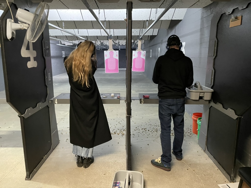 Two people at a shooting range