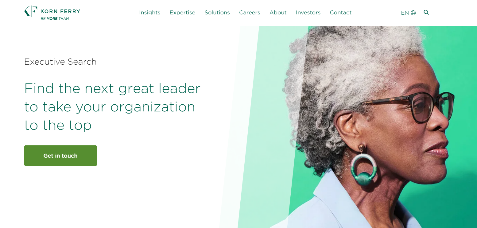 Screenshot of Korn Ferry's executive search web page showing a photo of a senior executive