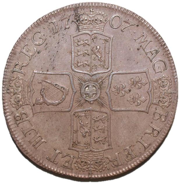 A close-up of a coin

Description automatically generated