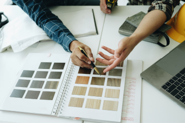 ways to give your remodeling contractor more clarity during a project designers selecting materials from visual reference custom built michigan