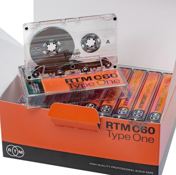 A cassette tape in a box

Description automatically generated