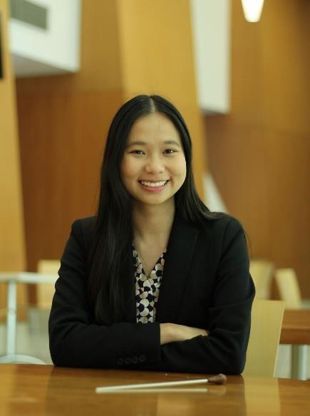 A person smiling at camera  AI-generated content may be incorrect.