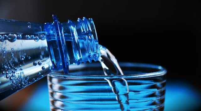 Pouring water in a glass