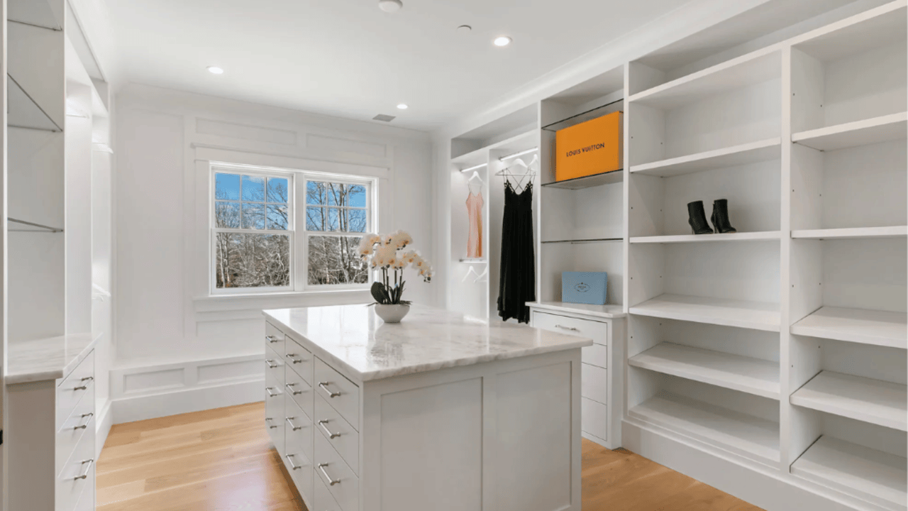 Tour This 8,094 Sq Ft Shingle-Style Waterfront Estate in Quogue, NY with Floating Staircase and 300-Bottle Wine Cellar