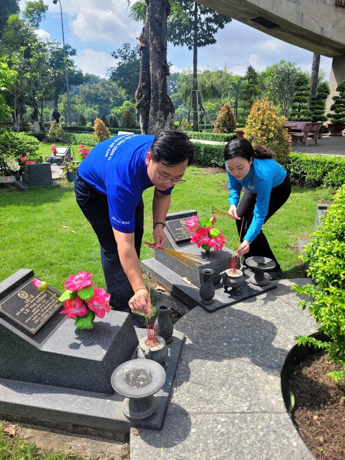 A person and person in a cemeteryAI-generated content may be incorrect.