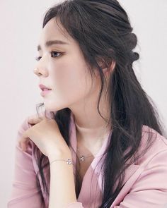 This contains an image of an image of Han Ga putting on pink dress