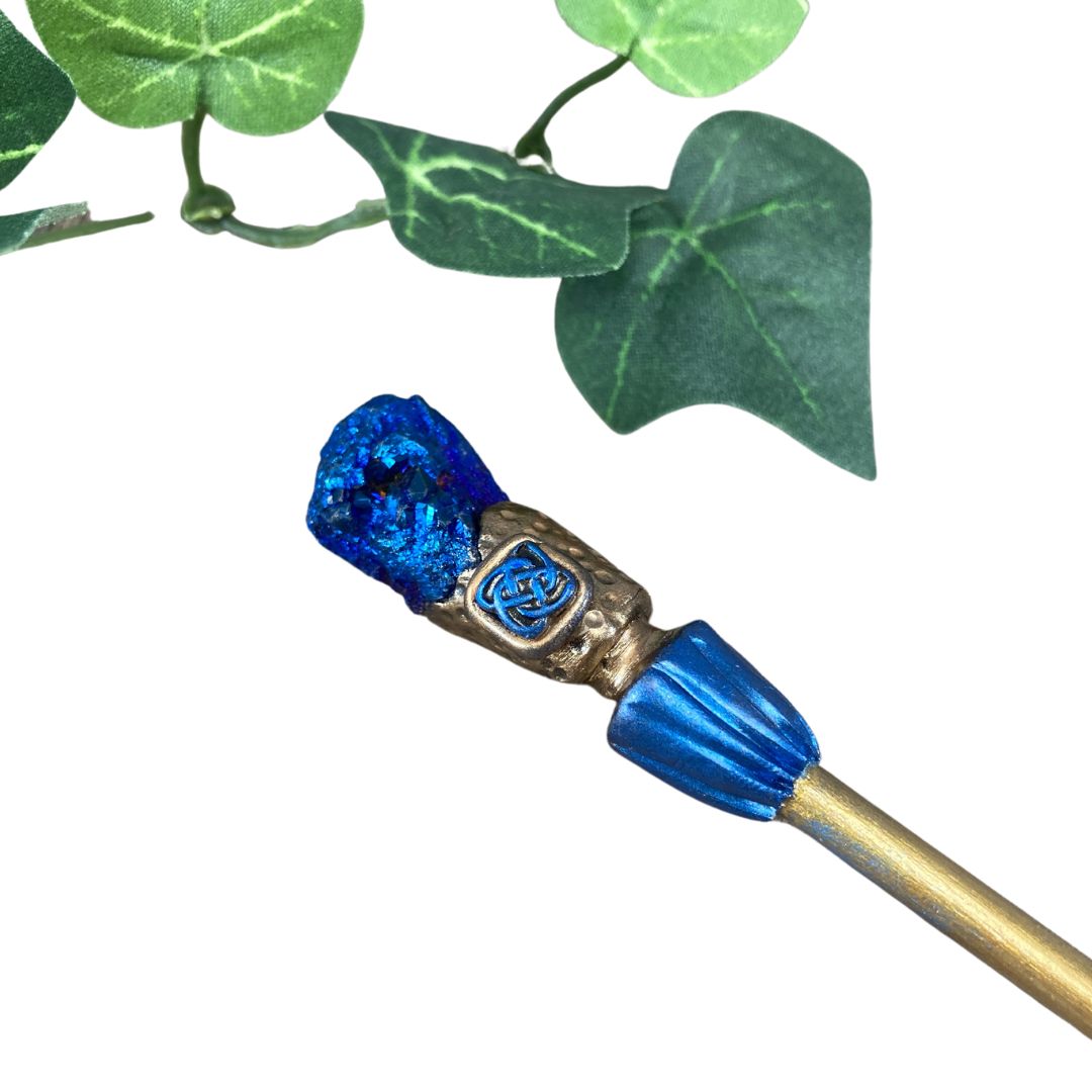 Blue Celtic crystal druzy hair stick against a white background