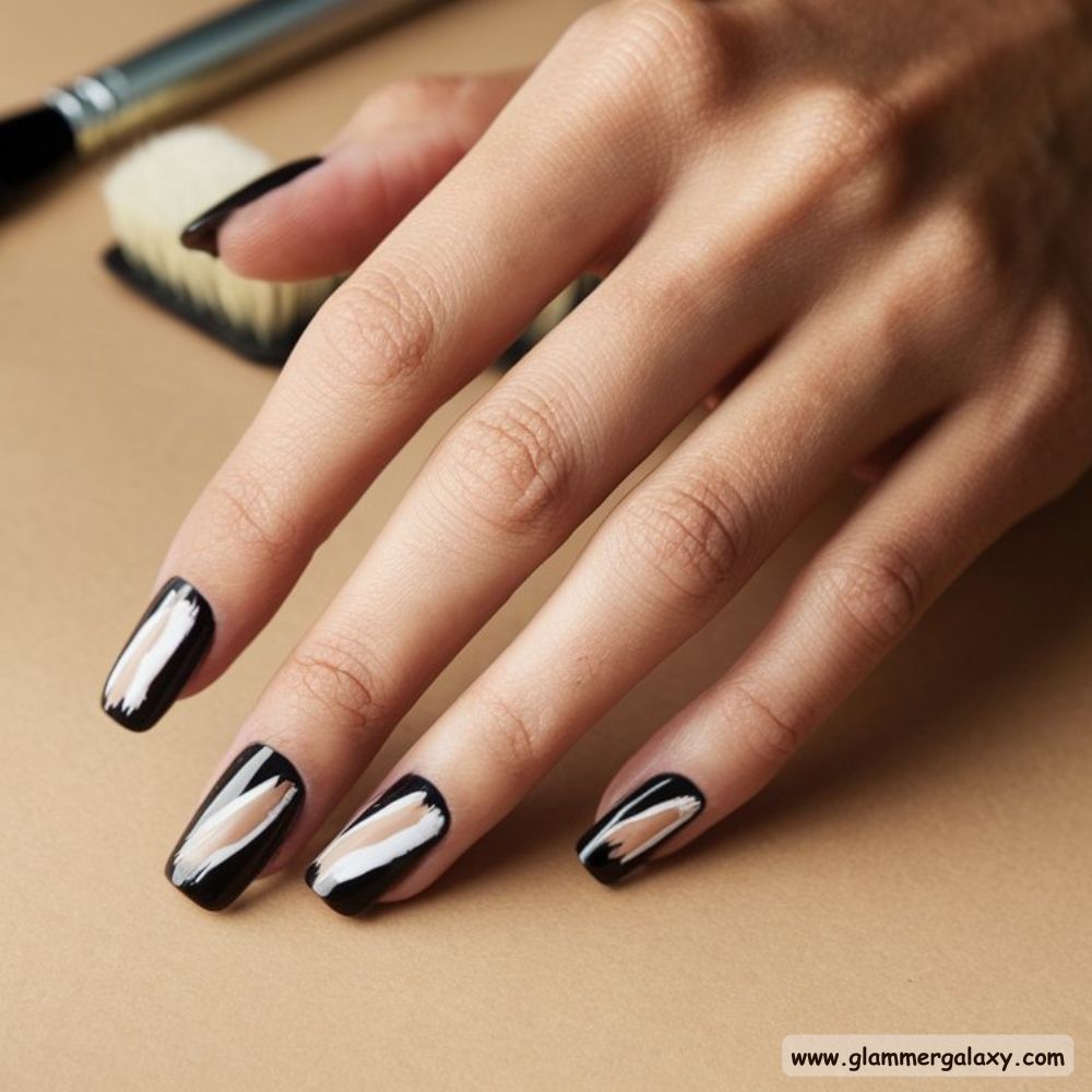 Black Fall Nails having Artistic Brush Strokes
