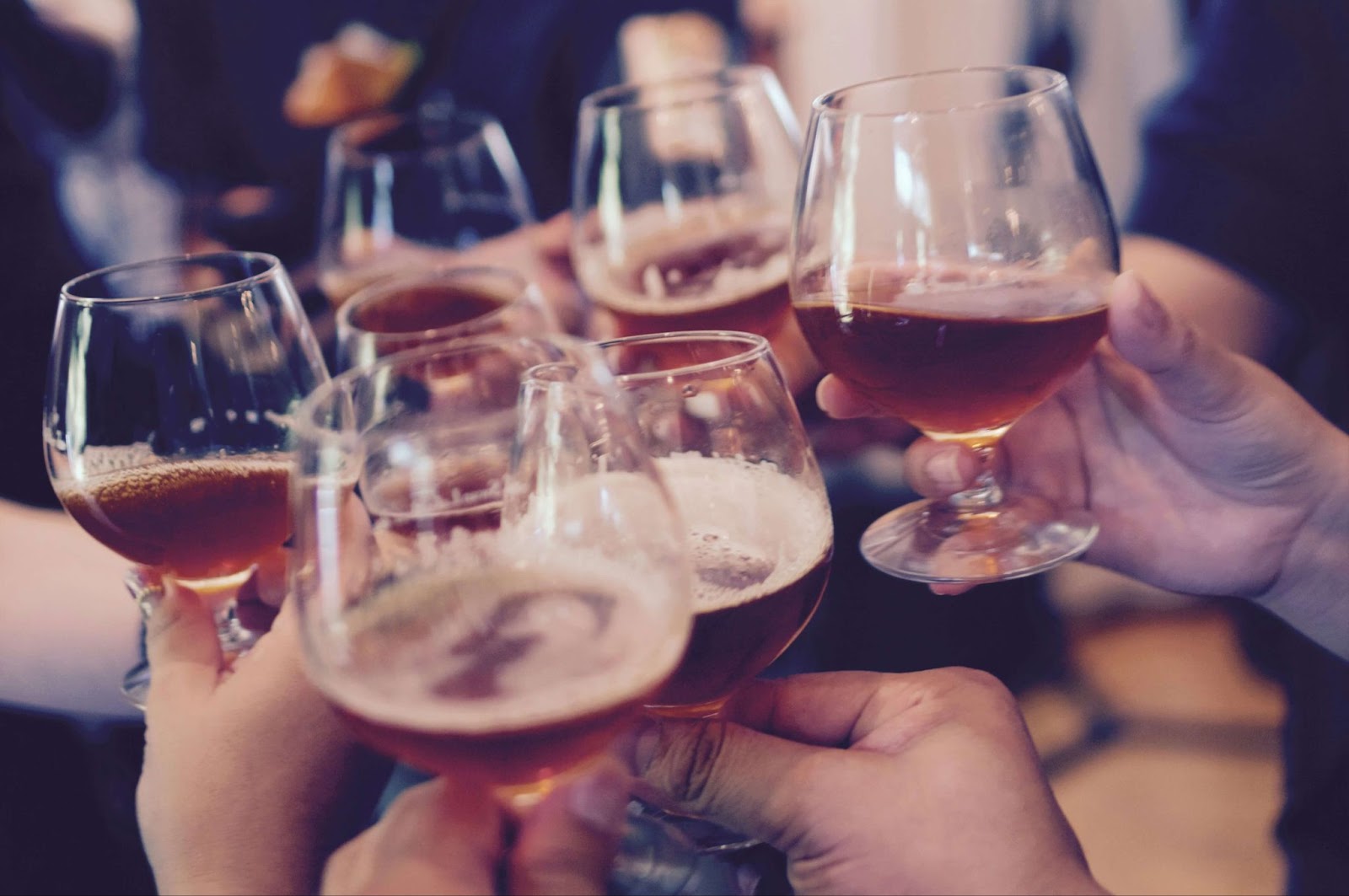 People cheersing beer