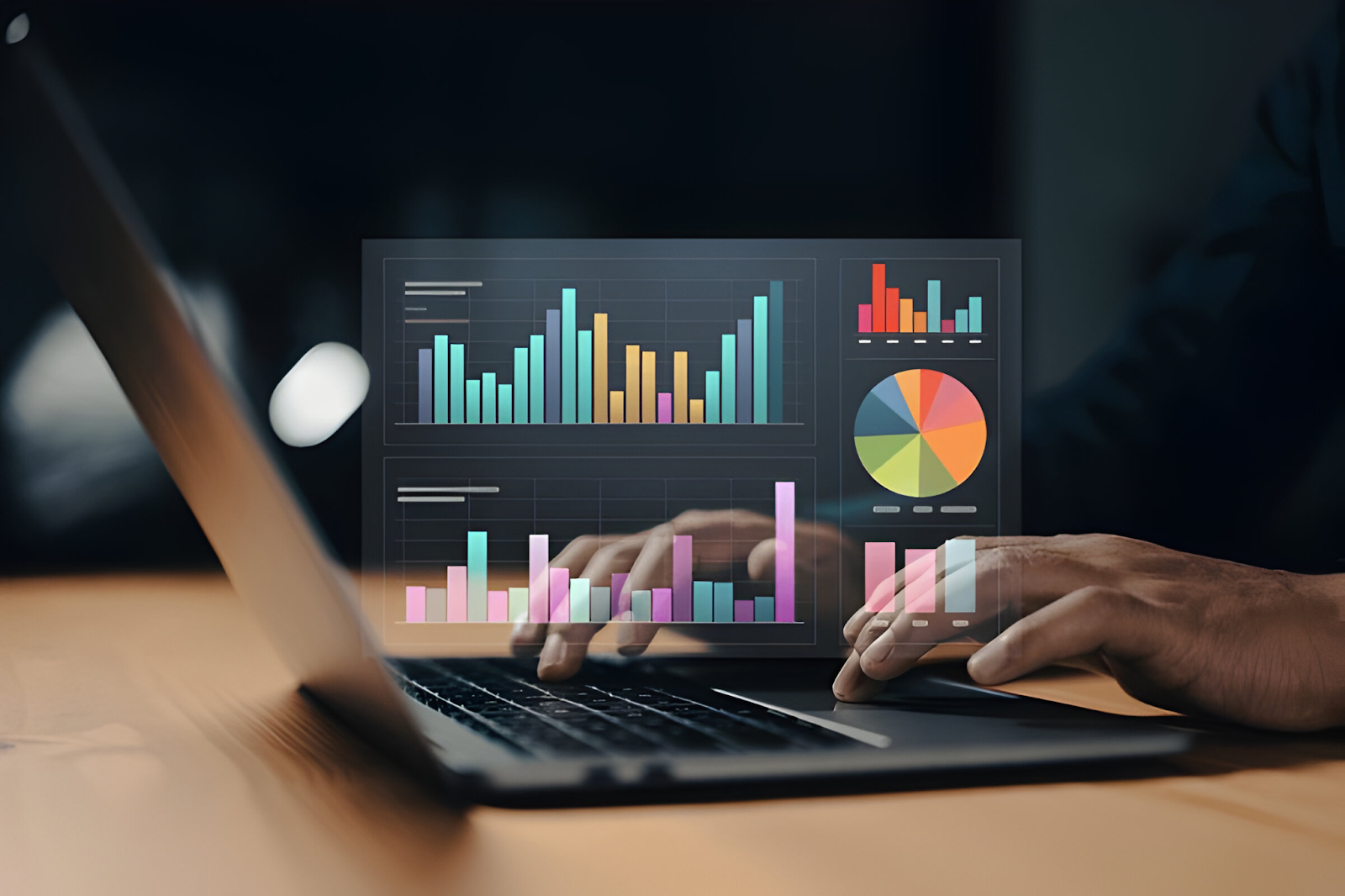 Person analyzing budgeting and forecasting data on a laptop with vibrant charts and graphs, illustrating financial planning and analysis.