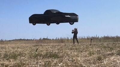 Jim Dukhovny CEO of Alef near the flying car during a flight test