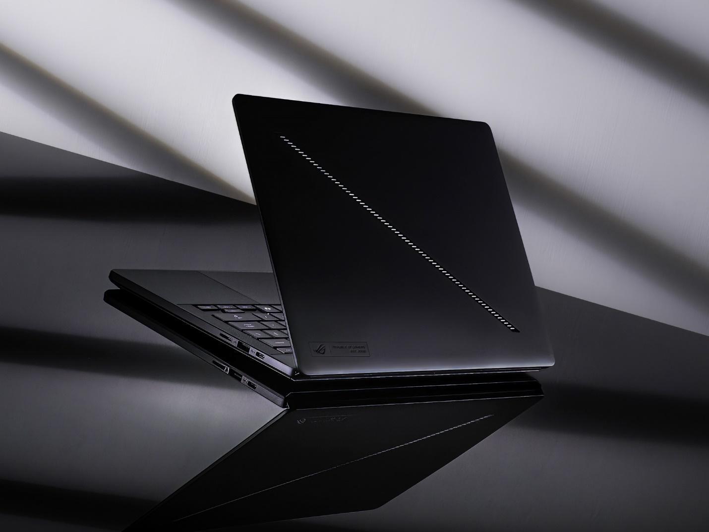 A black computer on a reflective surface

AI-generated content may be incorrect.