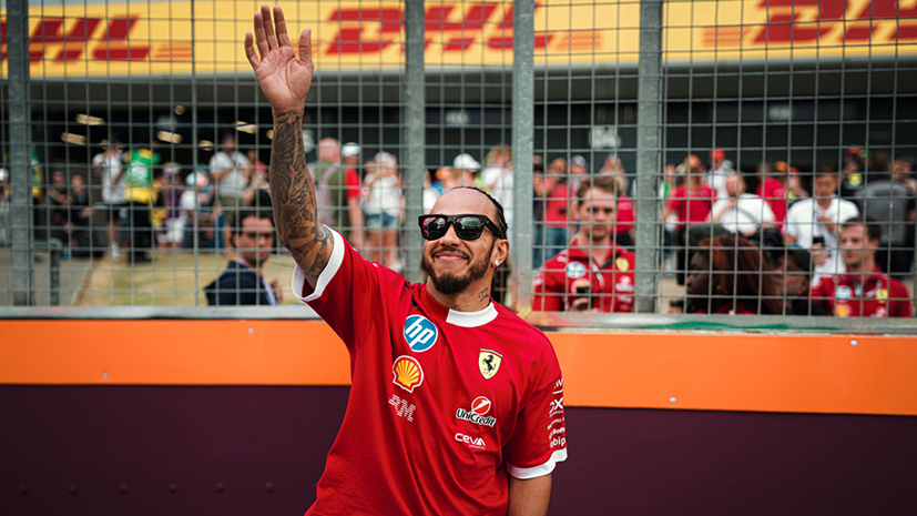 Lewis Hamilton of Scuderia Ferrari HP waving to fans at a the the British Grand Prix