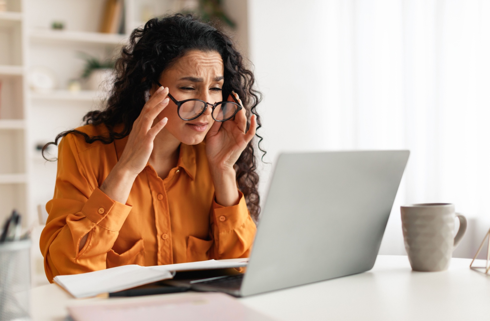 Person looking at a computer screen.