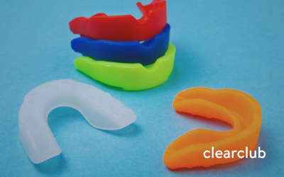 Five colorful sports mouthguards designed for physical activities, not for nighttime teeth grinding
