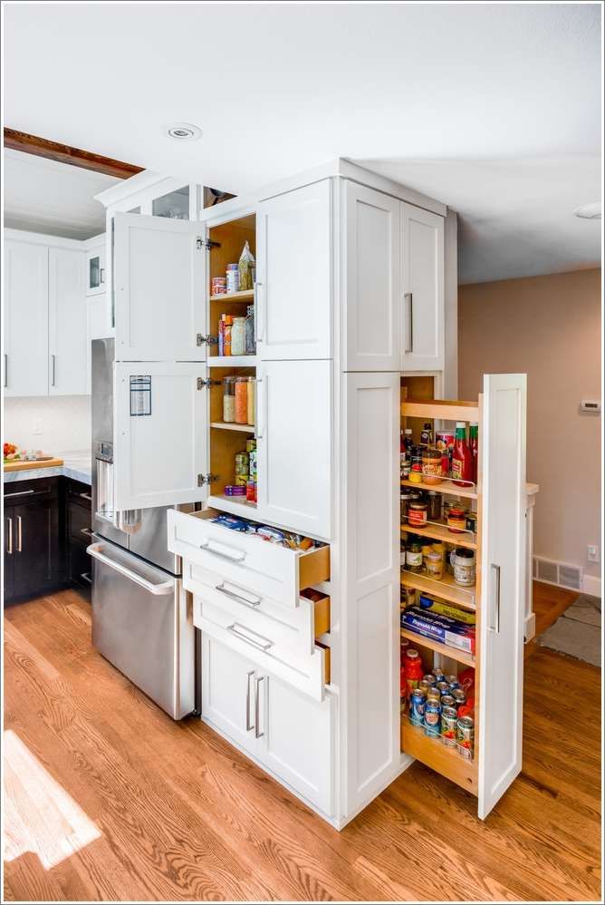 Tall, narrow cabinets maximise vertical space in a kitchen.